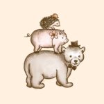 The BeanCurious label for Kongo Estate coffee from Papua New Guinea features a hedgehog wearing a bowler hat, on top of a pig with a flower in it's ear, on top of a brown bear with a top hat and bow tie.