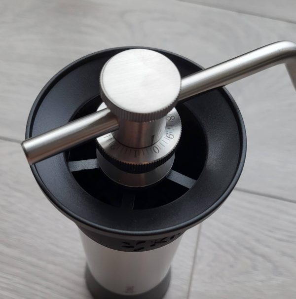 The wide mouth of the Kinu M47 Pheonix hopper makes it easy to add beans without spilling.